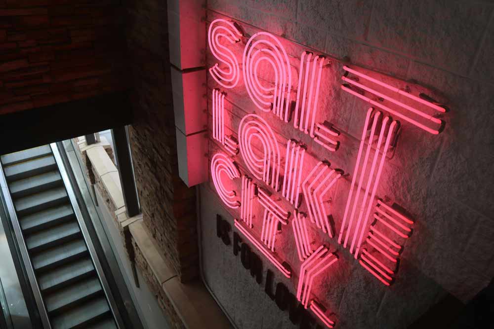 Pink neon sign reading Salt Lake City