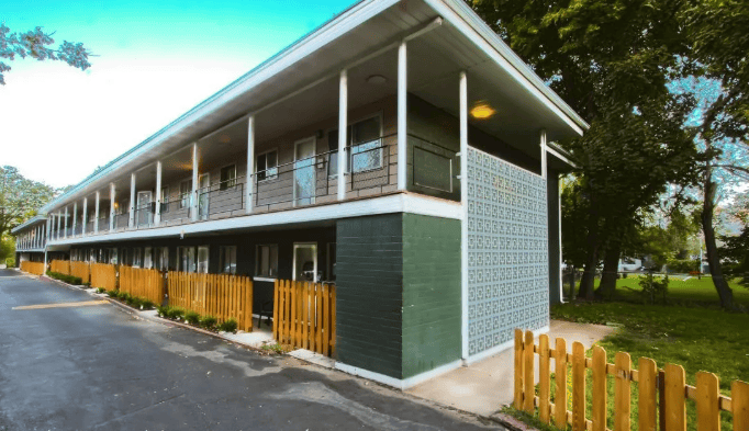 Two-storey apartment row with exterior walkways
