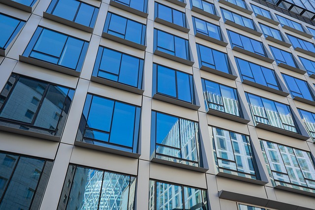 Blue glass facade of an office building